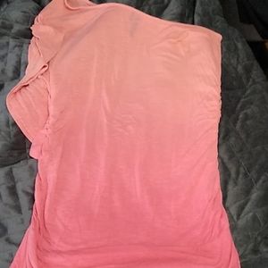 One shoulder peach colored top